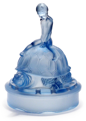 Sky-blue-pressed-glass-figurine-of-a-naked-young-girl-riding-a-turtle.-Walther-and-Sohne,-Radeberg,-Germany,-c1930-35